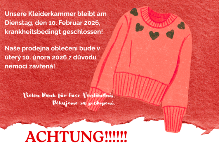 Ein Pullover auf einem roten abgerissenen groben Strukturpapier mit dem Hinweis der krankheitsbedingten Schließung unserer Kleiderkammer.