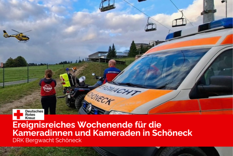 Der Krankenwagen der Bergwacht Schöneck steht auf einer Wiese, davor zwei Kameraden welche die Landung des Rettungshubschraubers verfolgen